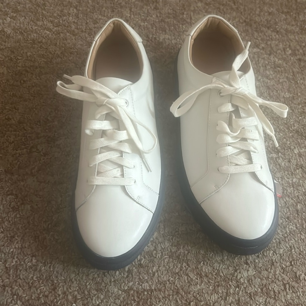 white with  navy blue soles on the. bottom never worn cute